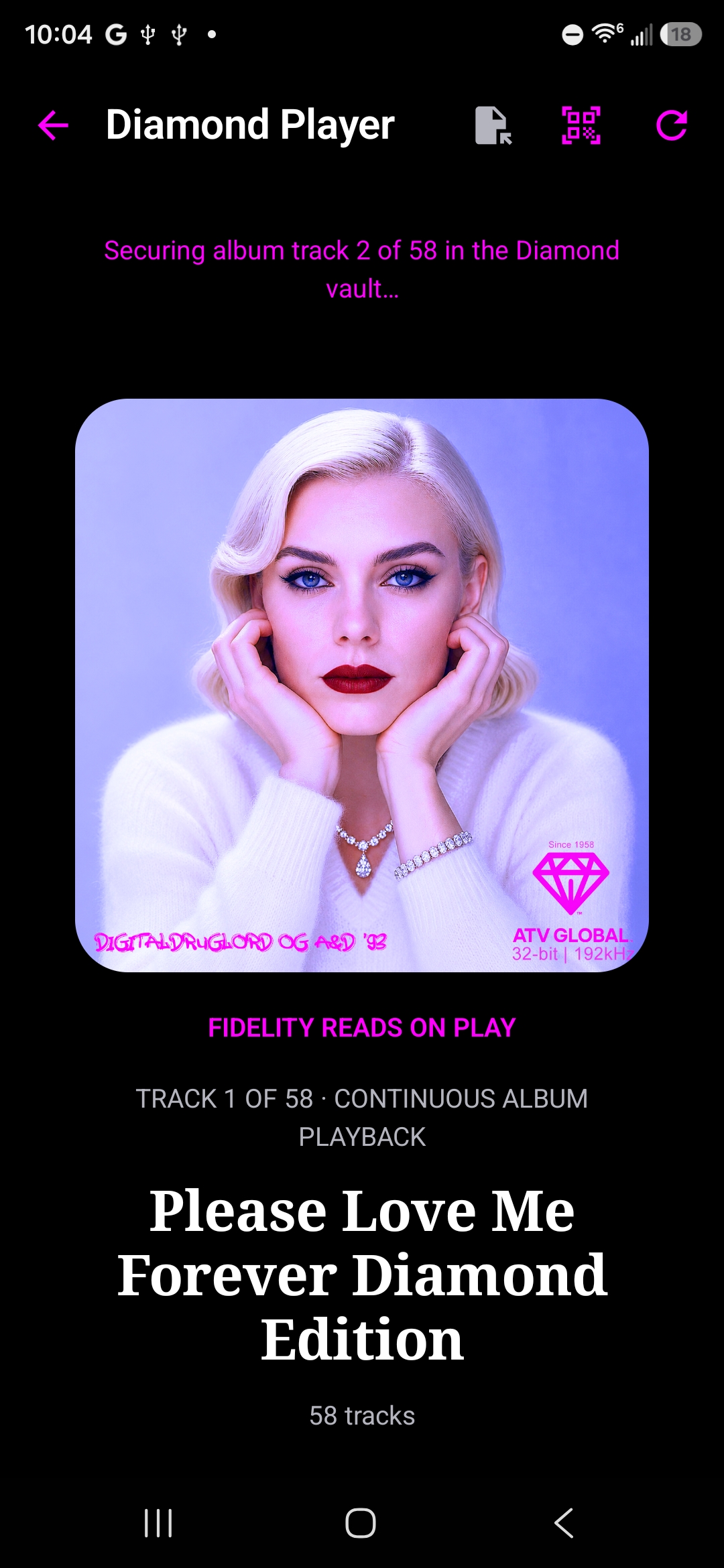 Diamond Player securing and playing a high-resolution USPS Music album